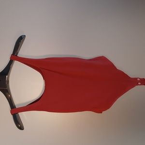 Garage Bodysuit top.  Snap closure.   Small. Dark rust colour.  Stretche…